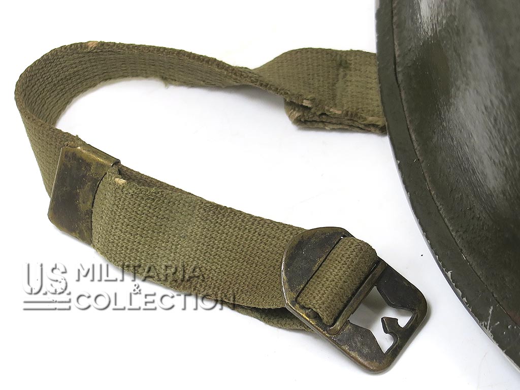 Bouclerie en laiton moulée sur casque McCord pattes fixes