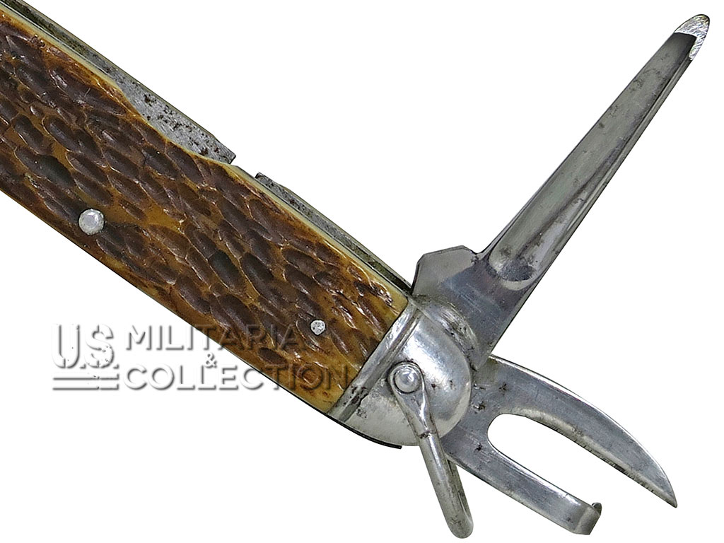 Poinçon du couteau utilitaire Camillus
