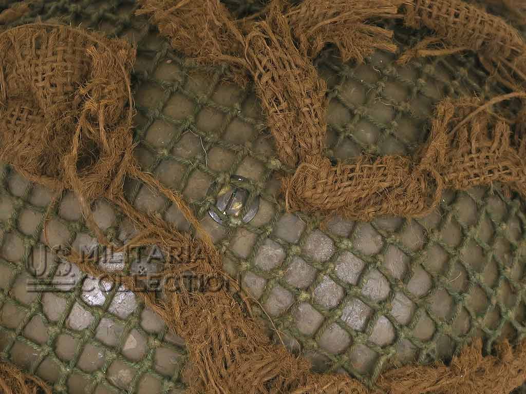 Détail du filet et des bandes de camouflage
